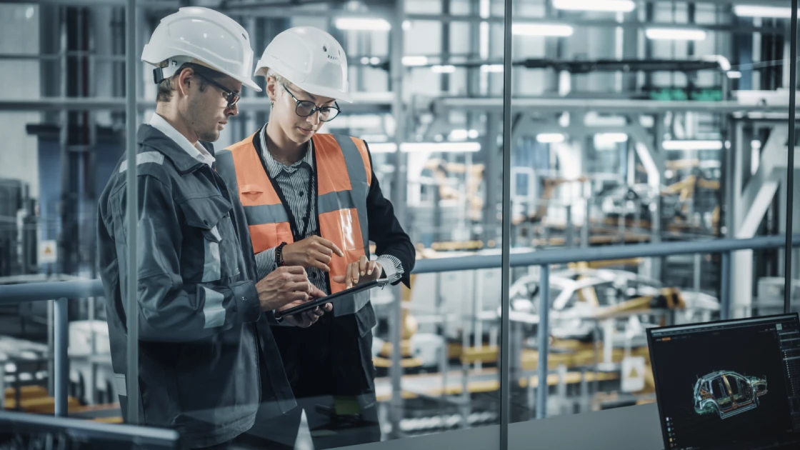 Man And Woman With Notebook